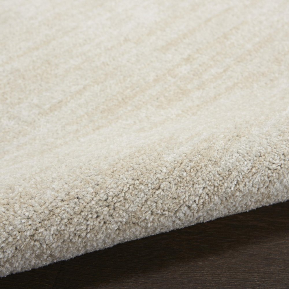 4' Beige And Ivory Round Indoor Outdoor Area Rug