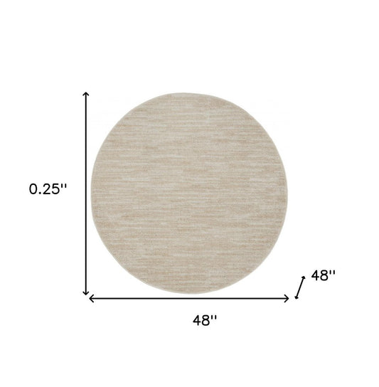 4' Beige And Ivory Round Indoor Outdoor Area Rug