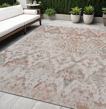 5' X 8' Beige Damask Stain Resistant Indoor Outdoor Area Rug