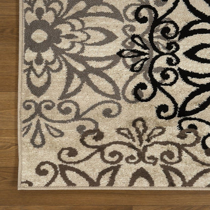 8' X 10' Beige Black And Brown Floral Medallion Area Rug
