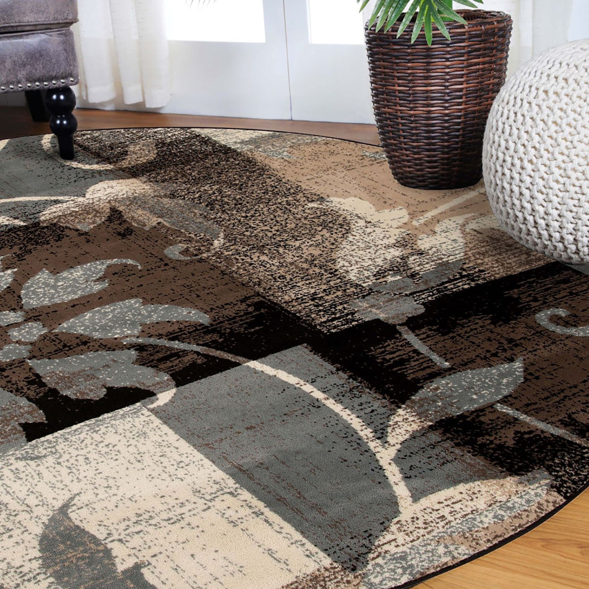 5' Beige And Black Round Floral Power Loom Distressed Area Rug