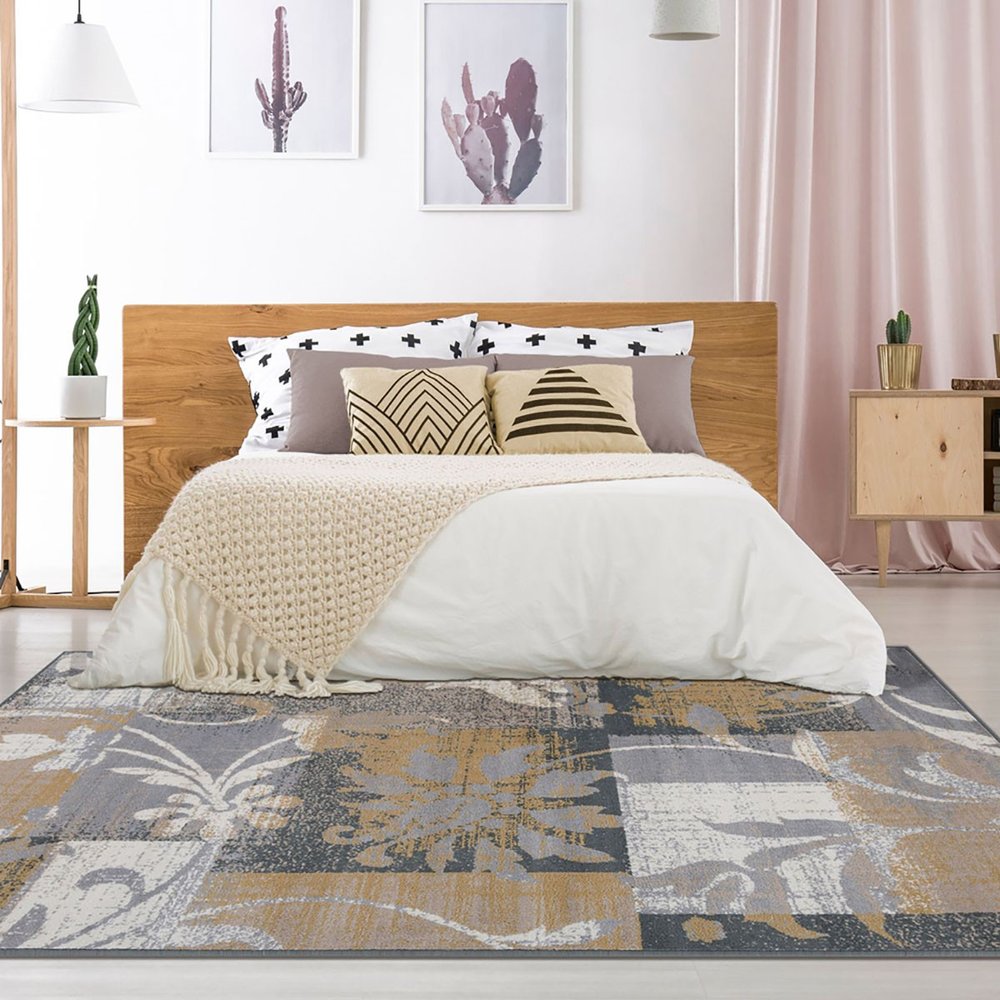 5' X 8' Beige And Black Floral Distressed Area Rug