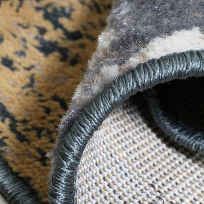 7' X 9' Beige And Black Floral Distressed Area Rug