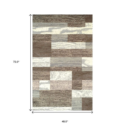 4' X 6' Blue And Ivory Patchwork Area Rug