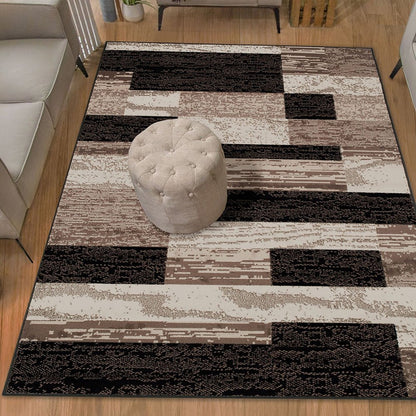 5' X 8' Black Brown And Beige Patchwork Area Rug