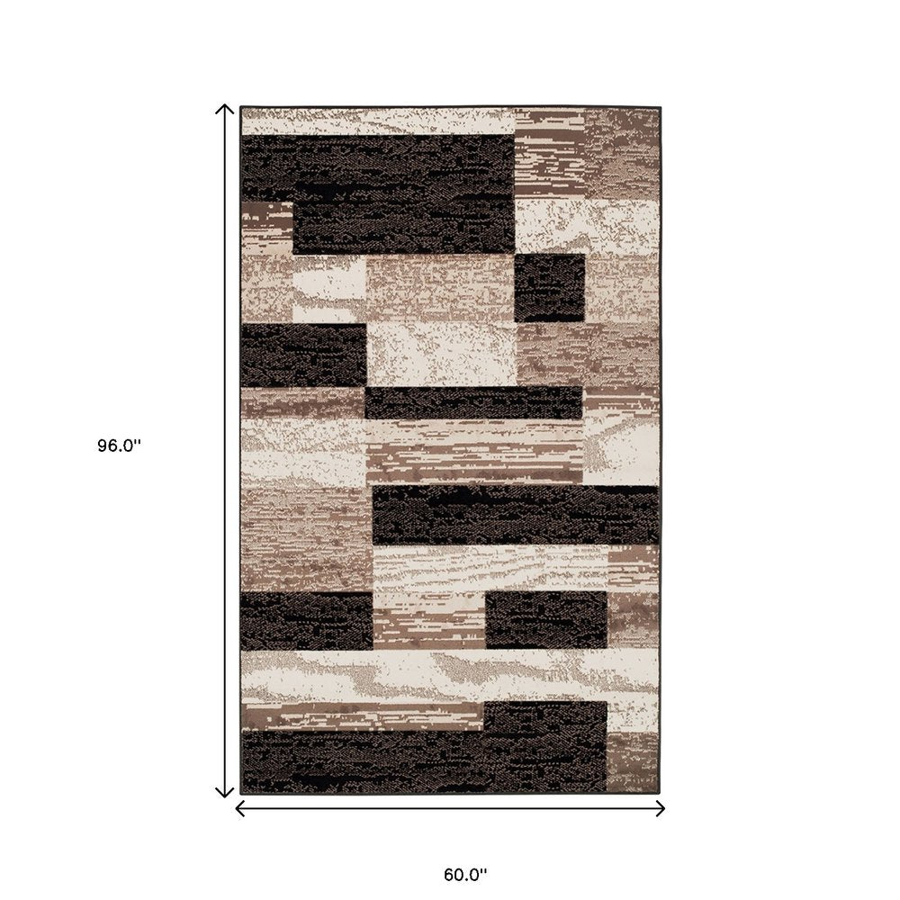 5' X 8' Black Brown And Beige Patchwork Area Rug