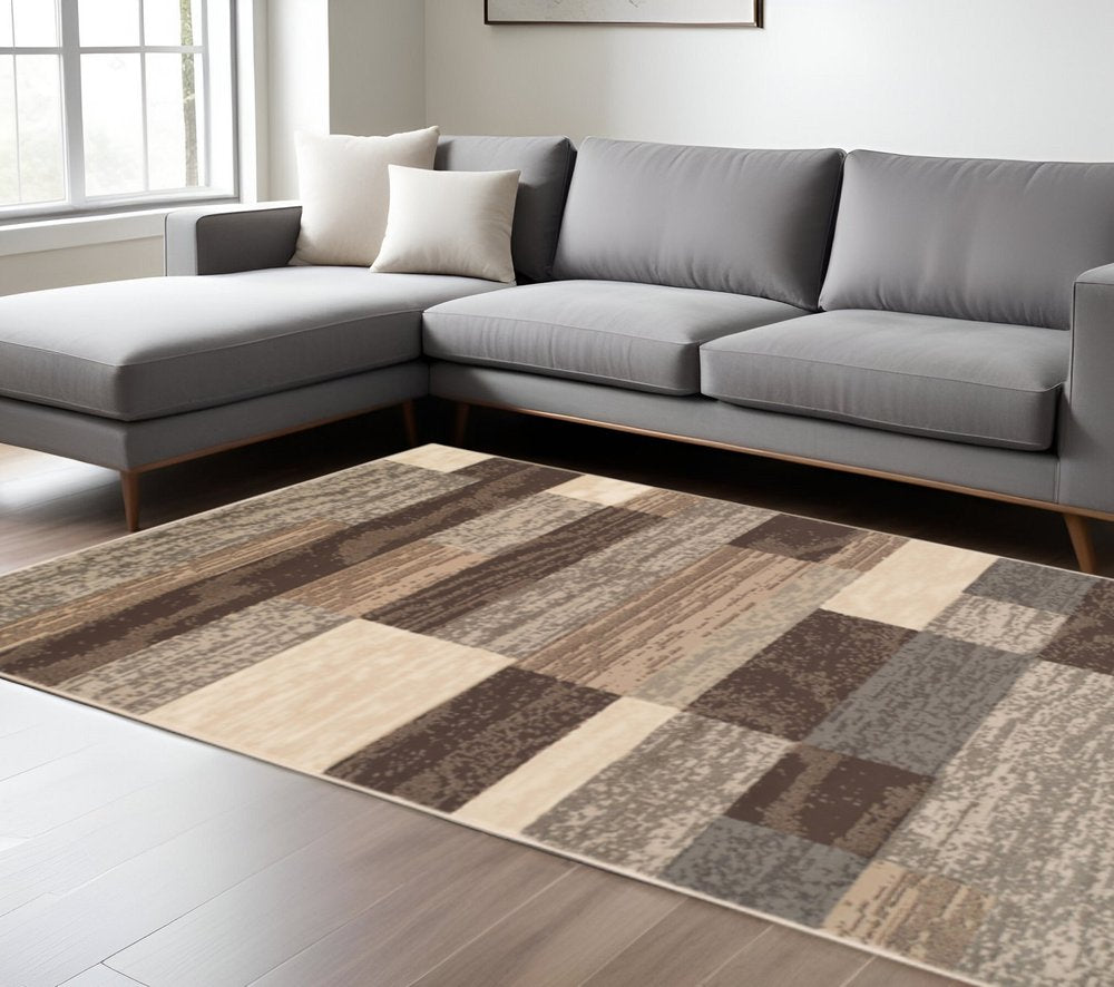 6' X 9' Beige Slate Gray And Brown Patchwork Area Rug