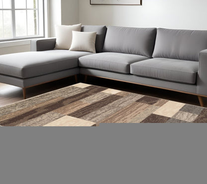 6' X 9' Beige Slate Gray And Brown Patchwork Area Rug