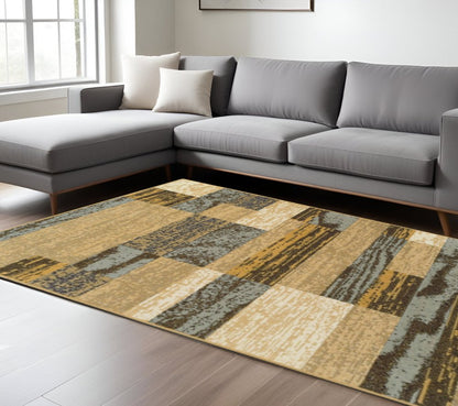 7' X 9' Blue And Beige Patchwork Area Rug