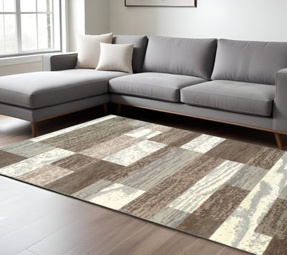 8' X 10' Blue And Ivory Patchwork Area Rug