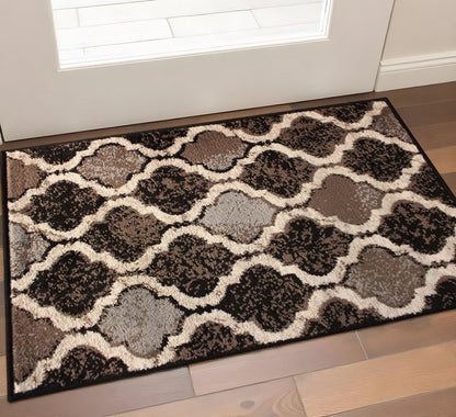 3' X 5' Brown Black And Ivory Quatrefoil Distressed Area Rug