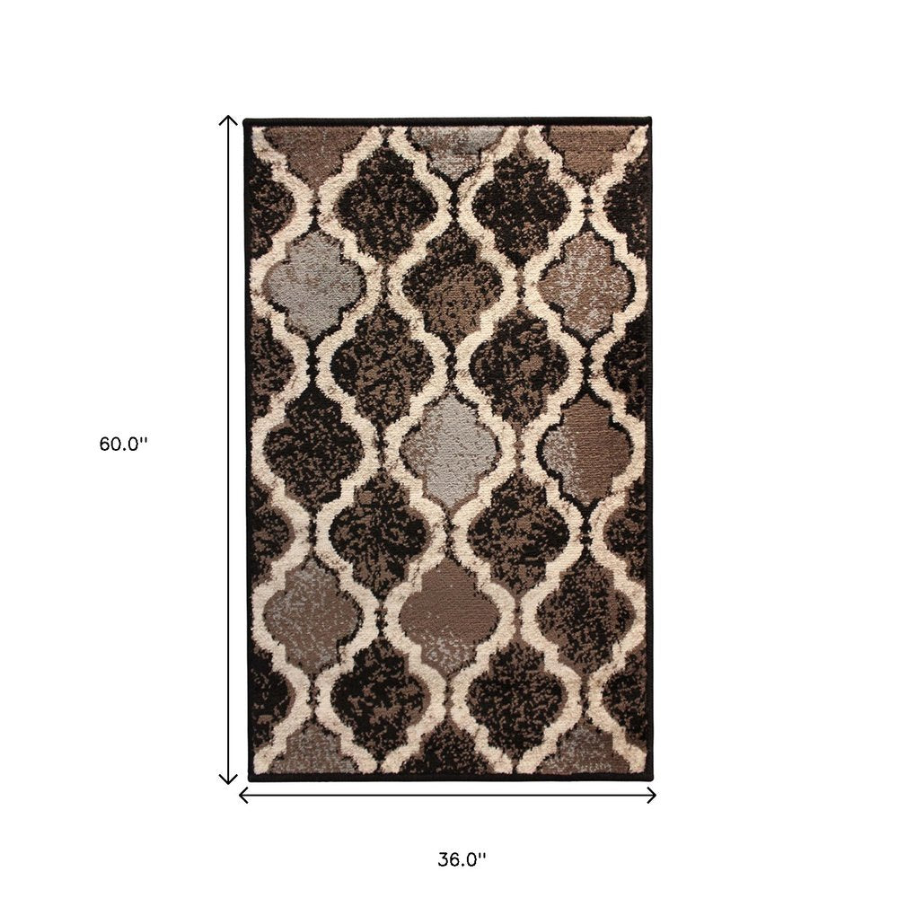 3' X 5' Brown Black And Ivory Quatrefoil Distressed Area Rug