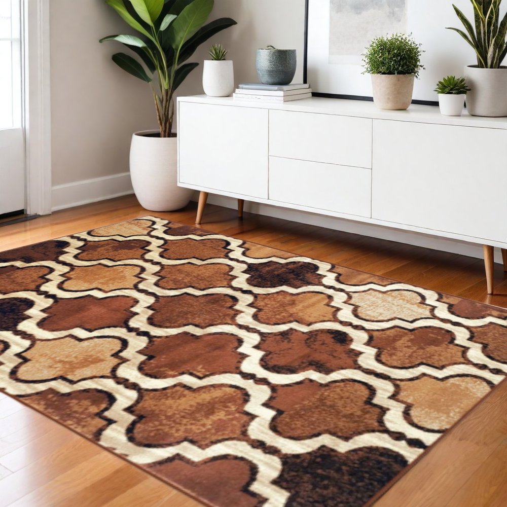 4' X 6' Brown And Ivory Quatrefoil Distressed Area Rug