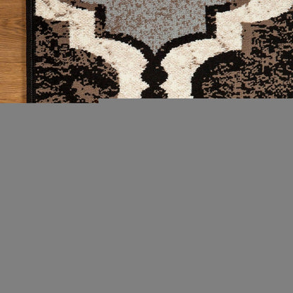 5' X 8' Brown Black And Ivory Quatrefoil Distressed Area Rug