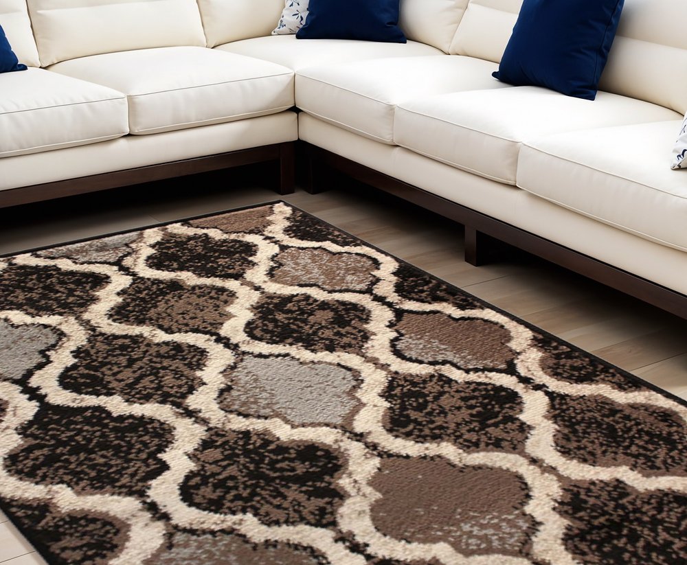 5' X 8' Brown Black And Ivory Quatrefoil Distressed Area Rug