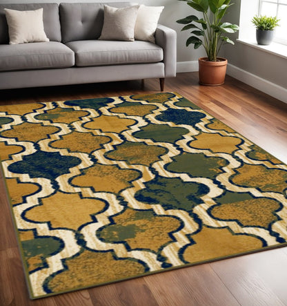 5' X 8' Green Brown And Ivory Quatrefoil Distressed Area Rug