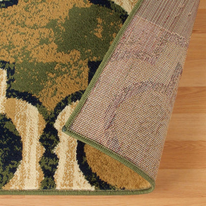 5' X 8' Green Brown And Ivory Quatrefoil Distressed Area Rug