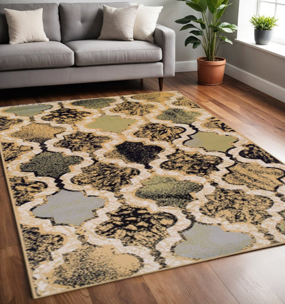 5' X 8' Black And Ivory Quatrefoil Distressed Area Rug