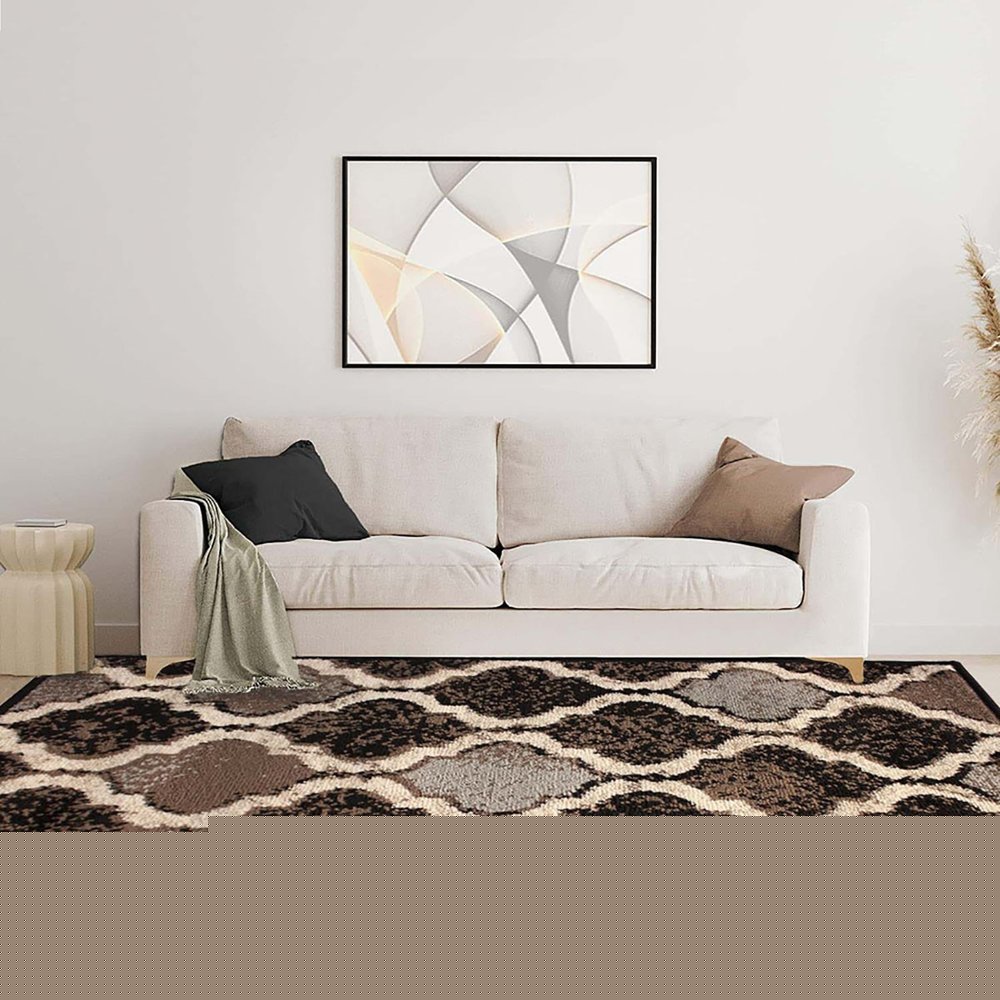 6' X 9' Brown Black And Ivory Quatrefoil Distressed Area Rug