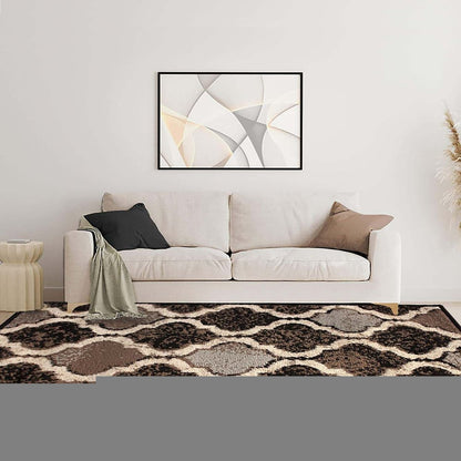 6' X 9' Brown Black And Ivory Quatrefoil Distressed Area Rug