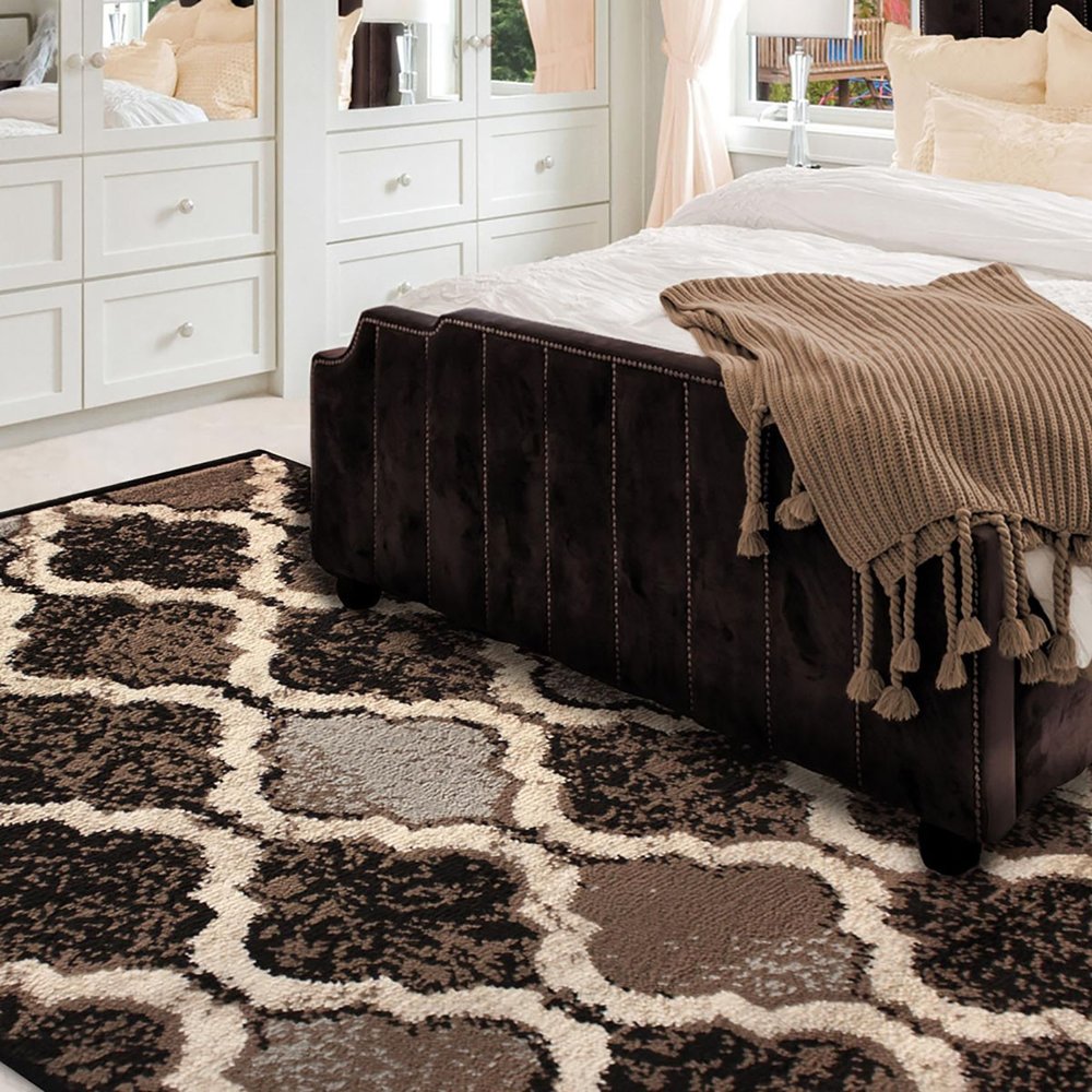 6' X 9' Brown Black And Ivory Quatrefoil Distressed Area Rug