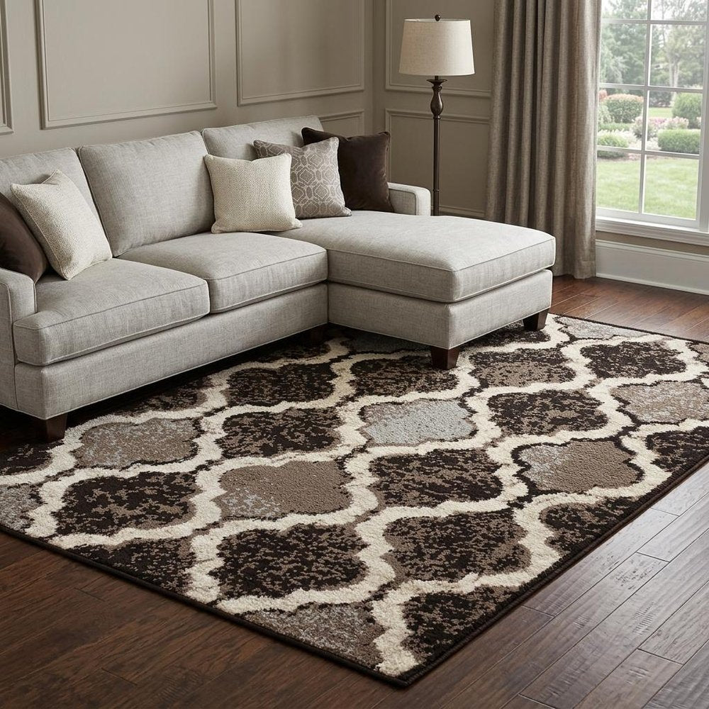 6' X 9' Brown Black And Ivory Quatrefoil Distressed Area Rug