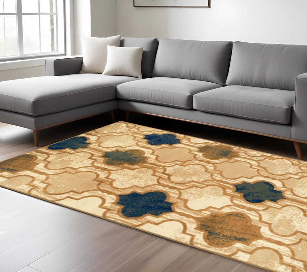 8' X 10' Cream Brown And Teal Quatrefoil Distressed Area Rug