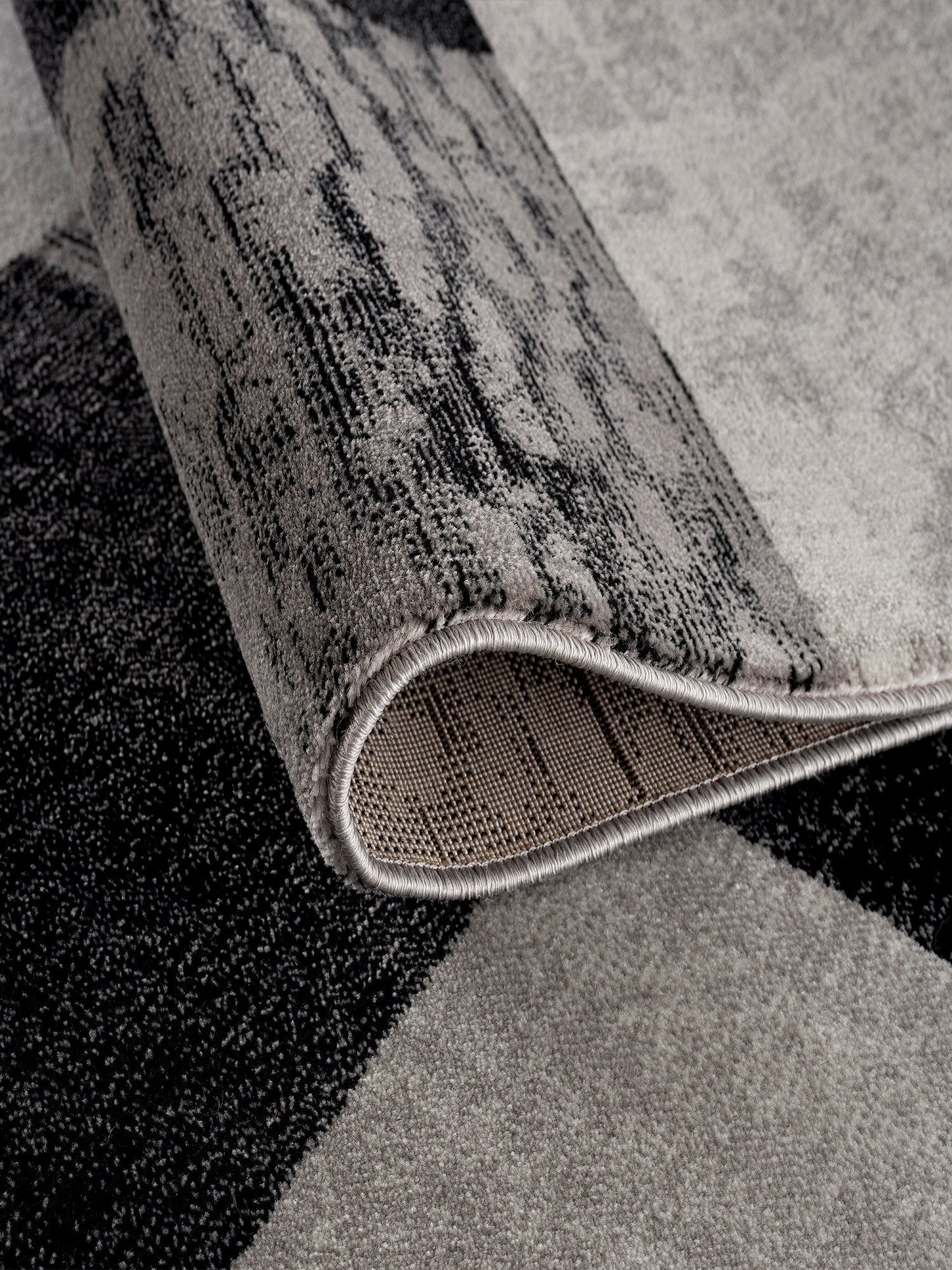 10' Gray and Black Geometric Power Loom Distressed Runner Rug