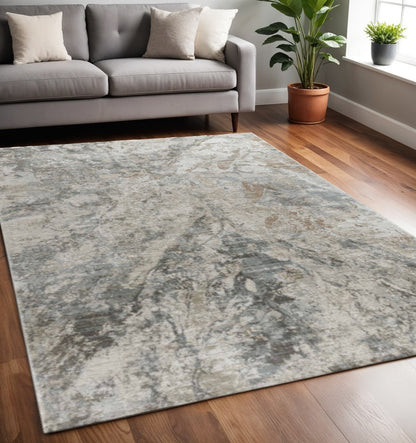 5' X 7' Beige Abstract Power Loom Area Rug