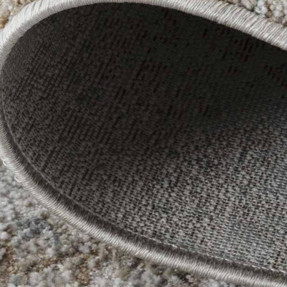 5' X 7' Beige Abstract Power Loom Area Rug