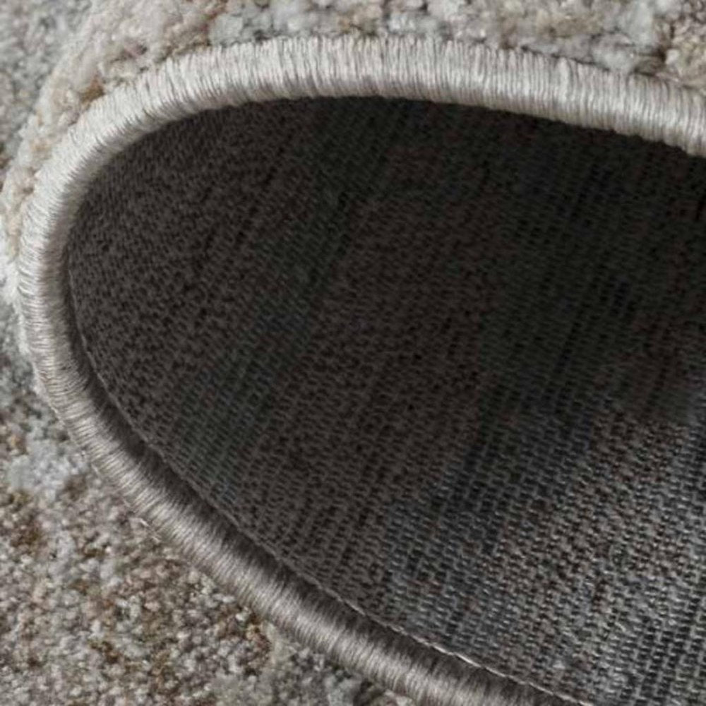 5' X 8' Beige Abstract Stain Resistant Area Rug