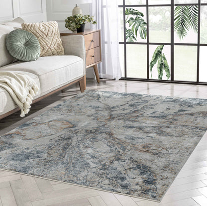 5' X 8' Beige and Blue Abstract Power Loom Area Rug