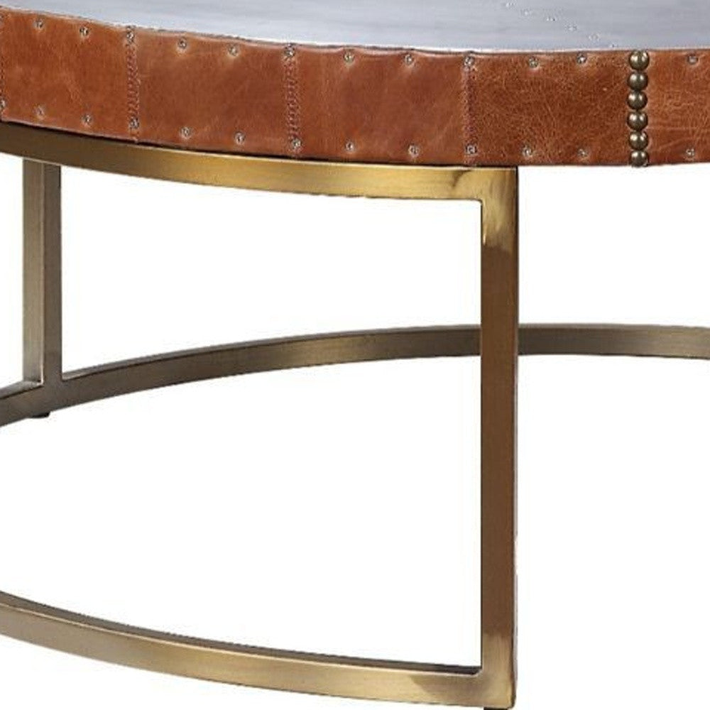 36" Brown And Silver Leather And Metal Round Coffee Table