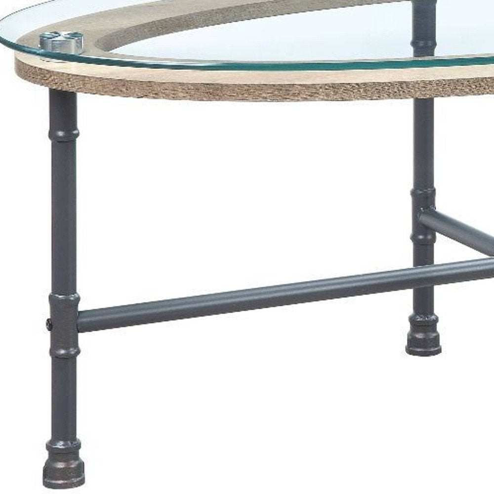 47" Clear and Gray Glass And Metal Oval Sled Coffee Table