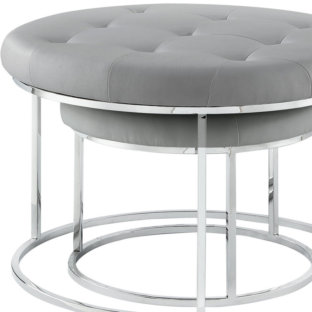 Set of Two Gray Faux Leather and Silver Tufted Round Ottomans