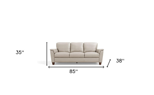 85" Beige Leather Sofa With Black Legs