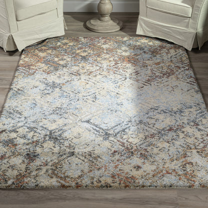 5' X 8' Brown Light Blue And Gray Distressed Diamond Area Rug