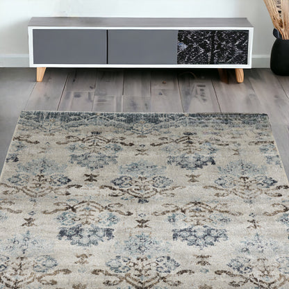 5' X 8' Blue and Ivory Oriental Area Rug