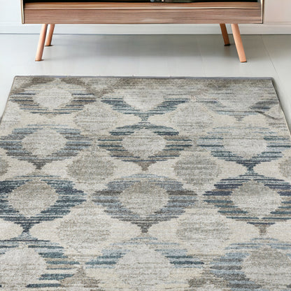 5' X 8' Blue and Ivory Geometric Area Rug