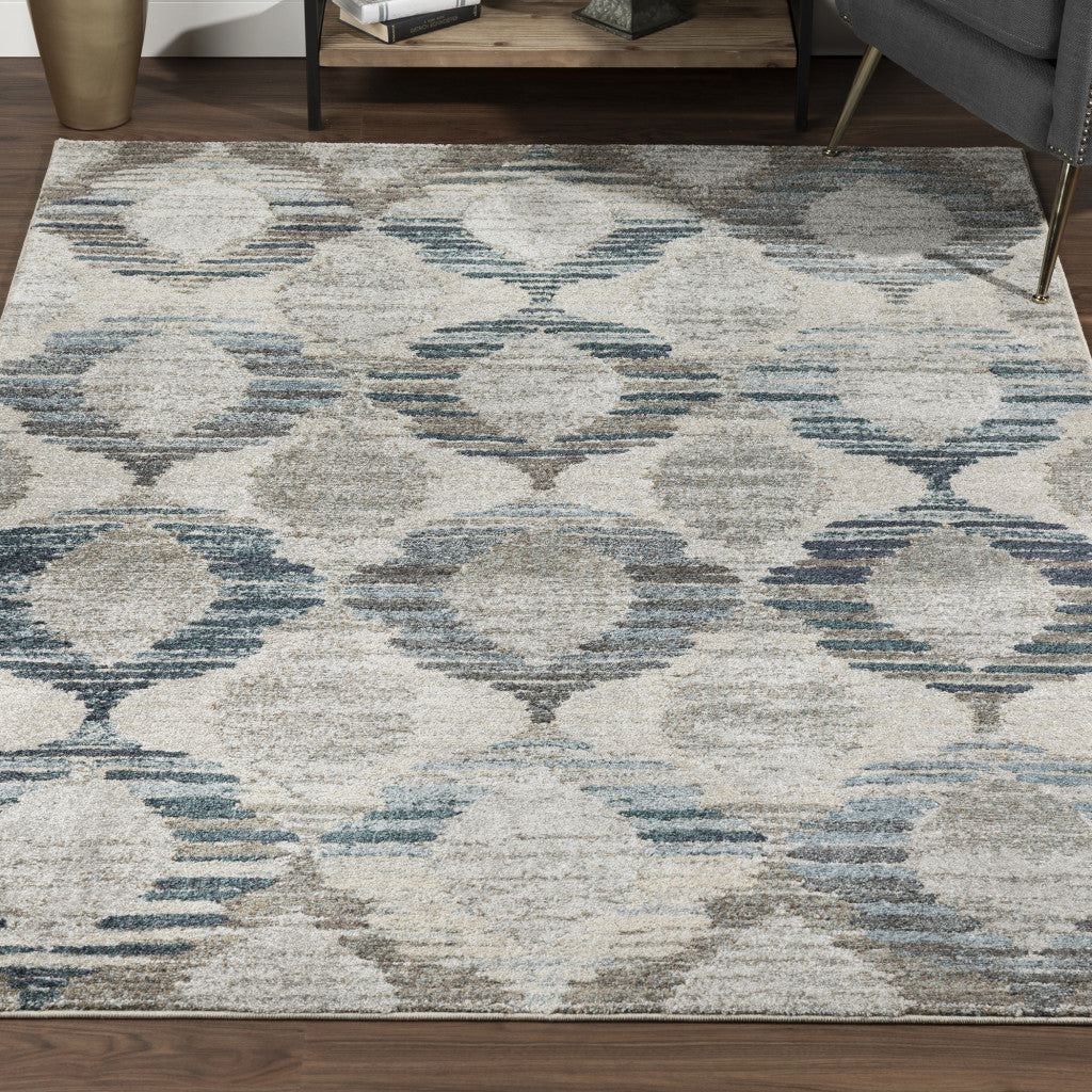 5' X 8' Blue and Ivory Geometric Area Rug