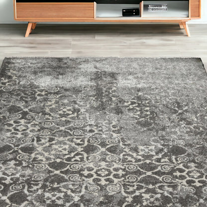 5' X 8' Gray and Ivory Oriental Distressed Area Rug