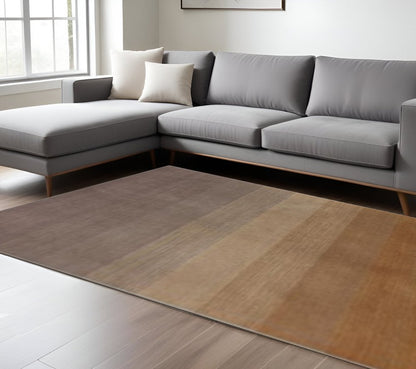 5' X 8' Gold And Rust Ombre Hand Loomed Area Rug