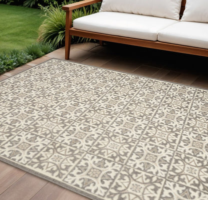 9' X 12' Ivory And Grey Fleur De Lis Stain Resistant Non Skid Area Rug