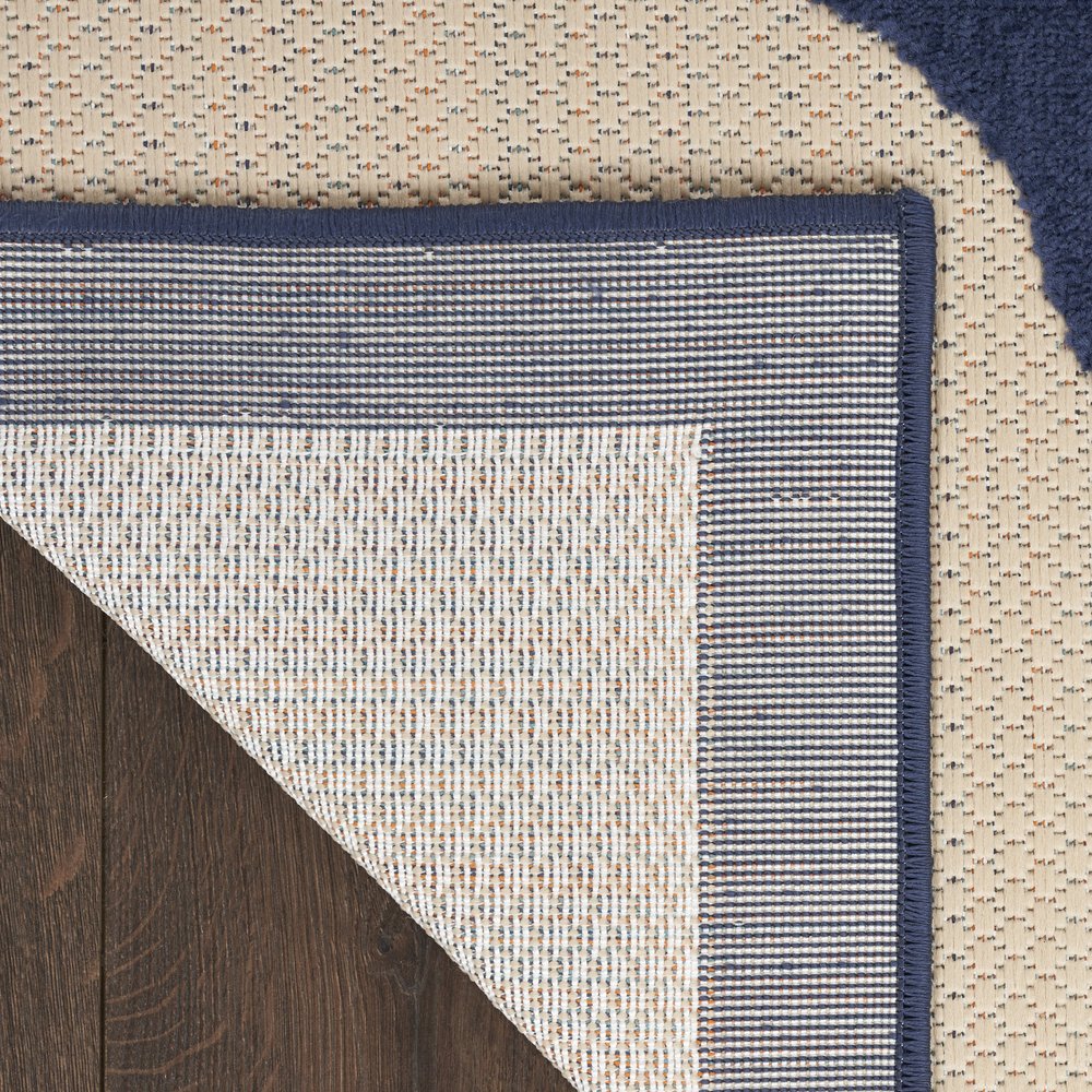 8' X 11' Ivory Blue and Orange Floral Non Skid Indoor Outdoor Area Rug