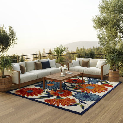 8' X 11' Ivory Blue and Orange Floral Non Skid Indoor Outdoor Area Rug