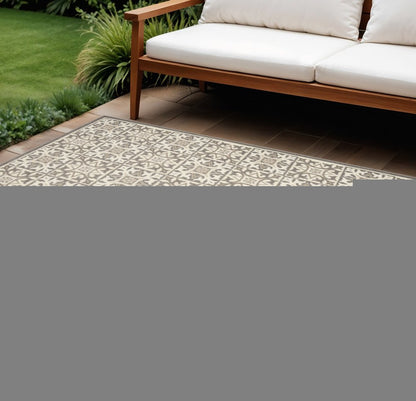 7' X 10' Ivory And Grey Fleur De Lis Stain Resistant Non Skid Area Rug