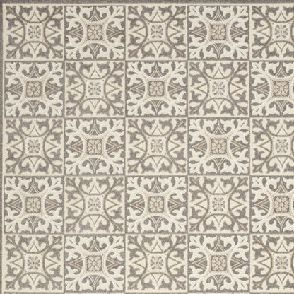 7' X 10' Ivory And Grey Fleur De Lis Stain Resistant Non Skid Area Rug