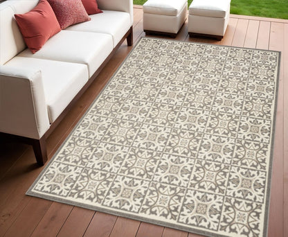 4' X 6' Ivory And Grey Fleur De Lis Stain Resistant Non Skid Area Rug
