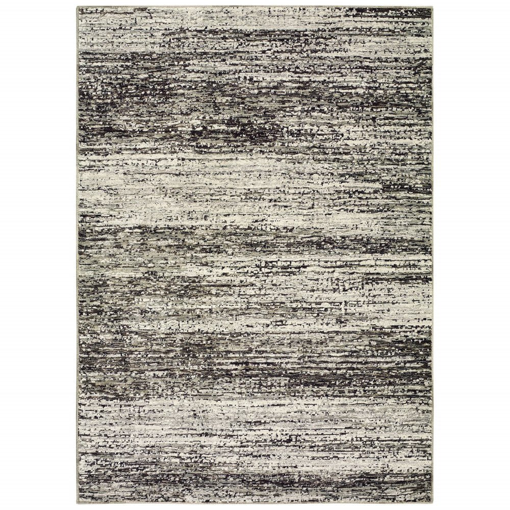 2' X 3' Gray and Ivory Abstract Power Loom Area Rug