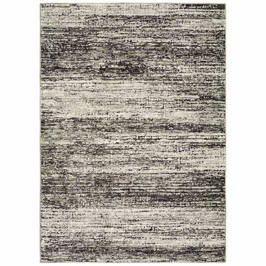2' X 3' Gray and Ivory Abstract Power Loom Area Rug